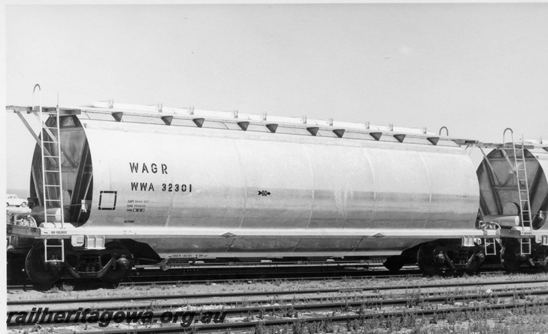 P17889
3 of 3 Midland built aluminium wheat wagons, WWA class 32301, wheat sheaf on side, end and side view
