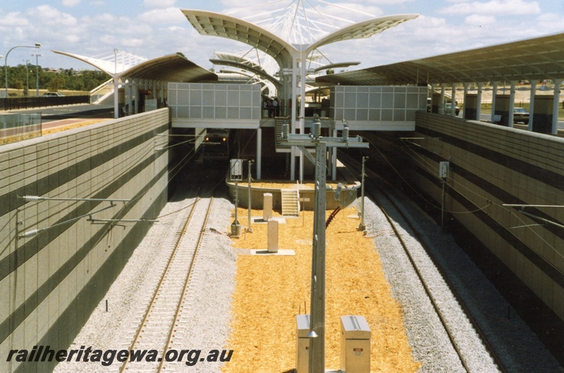 P17952
Joondalup railway station, tracks and island platform below ground level, 