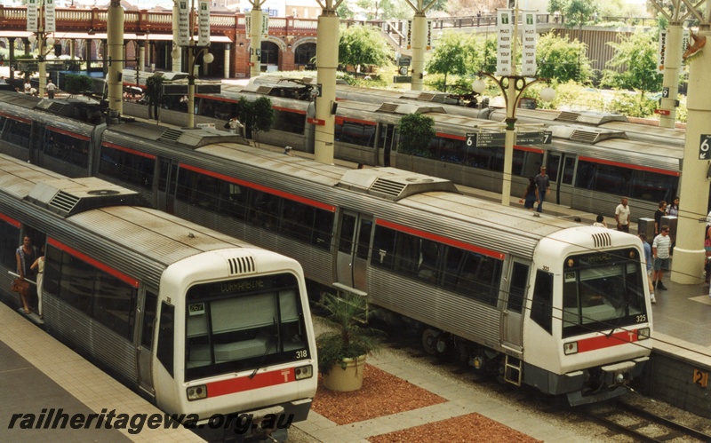 P17957
4 of 4 EMUs with the red stripe above the windows at Perth  Station, AEB class 318 with 