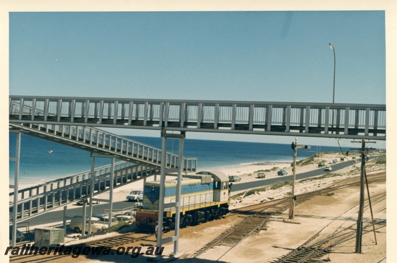 P17992
J class loco, running light, pedestrian footbridge, signal, Leighton yard, ER line, c1966
