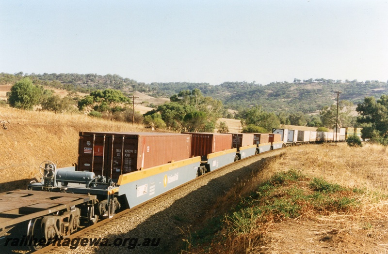 P18000
National Rail container wagons, forming part of Perth to Melbourne interstate freight train, 83 km post, Avon Valley line
