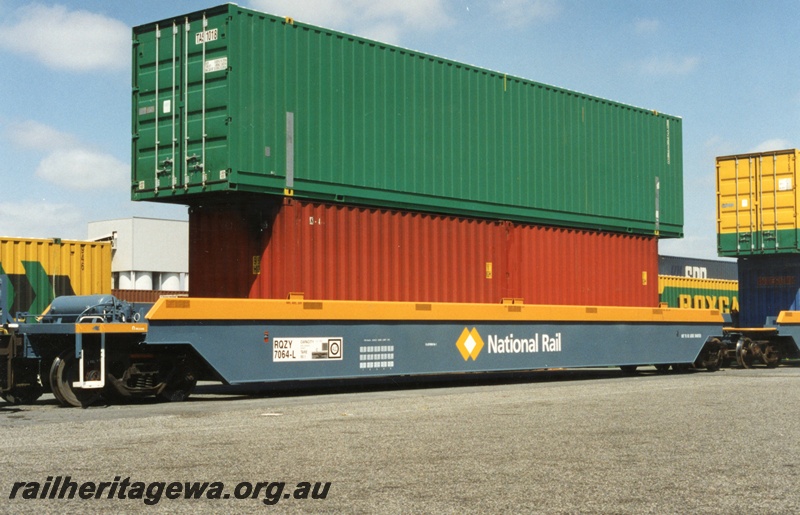 P18004
1 of 3 double stacked container wagons, National Rail RQYZ7064L class wagon, Kewdale yard, Goninan built, one of five permanently coupled together, end and side view
