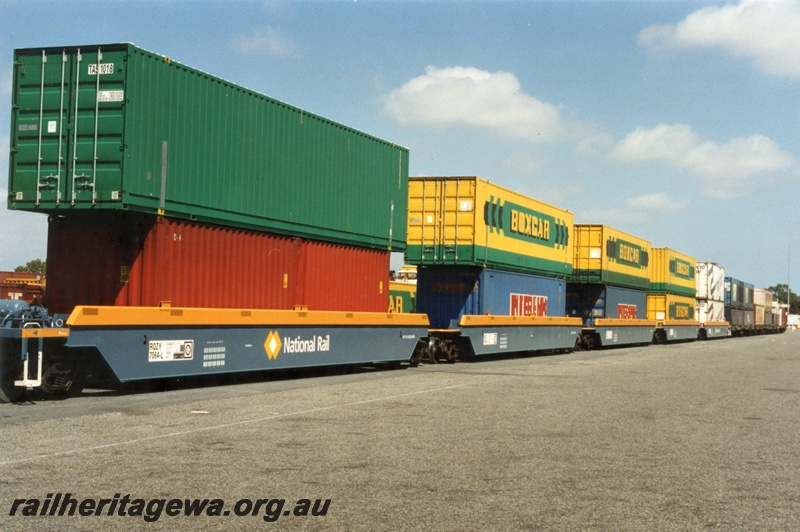 P18005
2 of 3 double stacked container wagons, five RQYZ7064L class container wagons, permanently coupled together, Kewdale yard, end and side view
