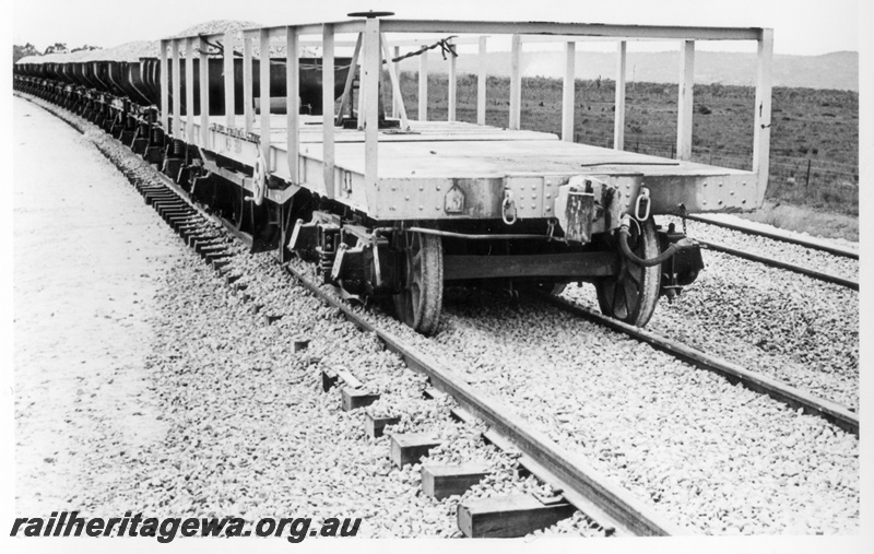 P18016
Derailed wagon, WSP class standard gauge ballast plough, Brixton Street, Kenwick, side and end view
