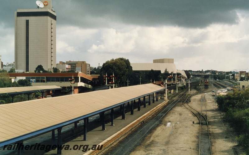 P18059
2 of 11 Construction of new Perth City station, platforms and canopies, bracket signals, signal box, Telstra building, scissors crossover, west end of Perth City station
