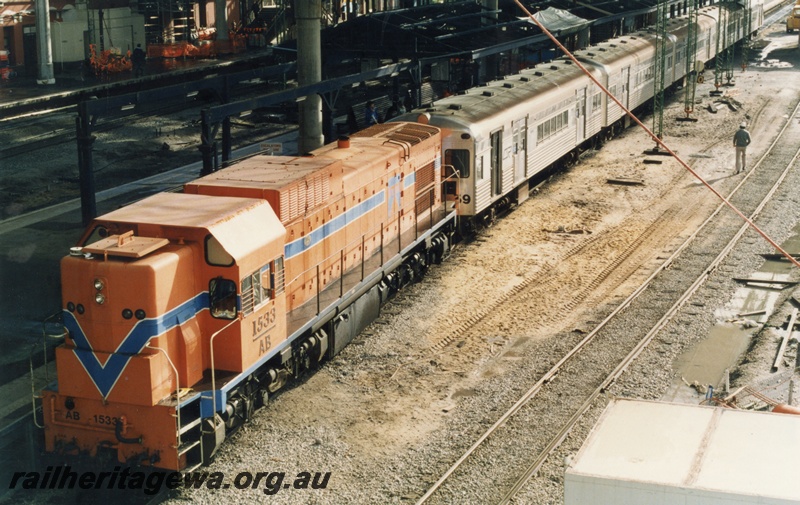 P18063
6 of 11 Construction of new Perth City station, AB class 1533, on service to Midland comprising Queensland stock, Perth City station
