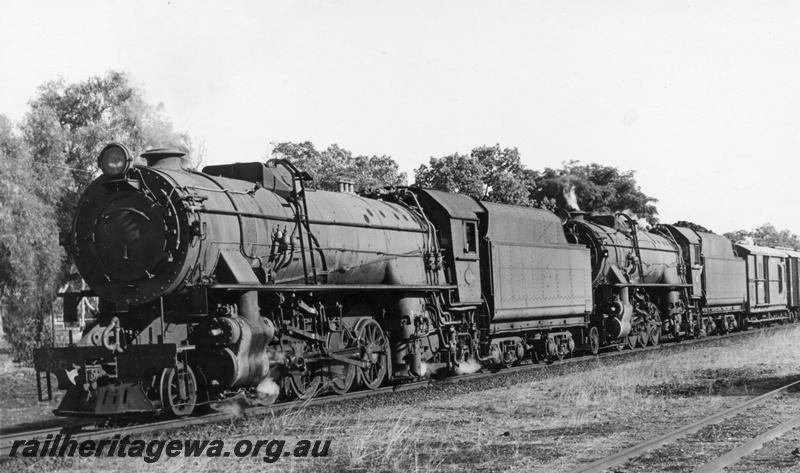 P18227
V class 1210 double heading with V class 1216 steam locomotives, front and side view, same as P5490.
