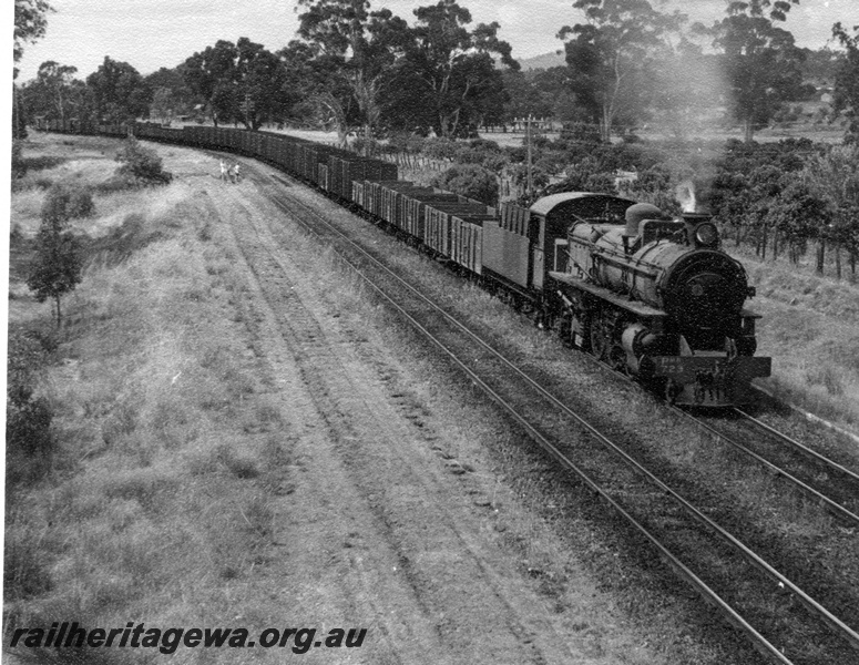 P18330
PMR class 723 on No 37 southbound goods train, approaching station, Armadale, SWR line, shows the bridges over the Neerigen Brook and the trackbed of the lifted line to Fremantle (FA line)
