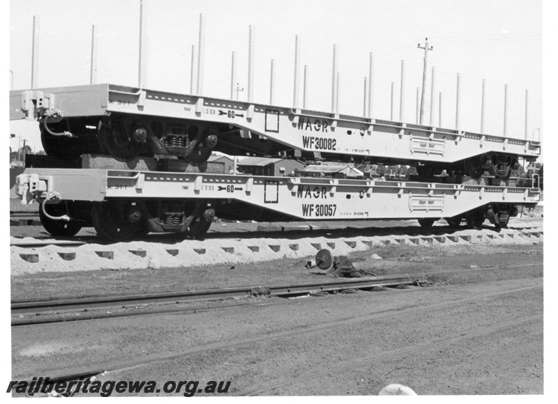 P18365
WF class 30082, WF class 30057, standard gauge wagons, Midland, end and side views
