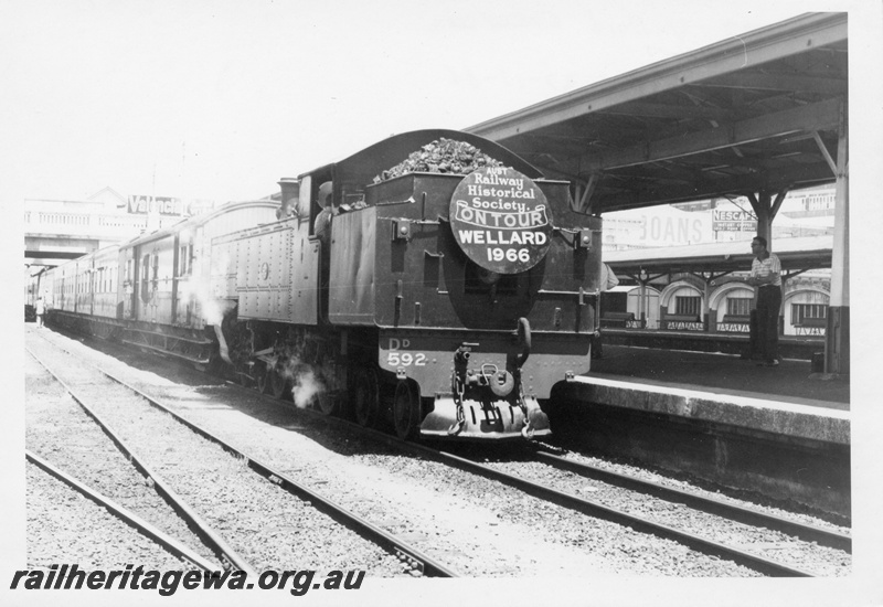 P18404
1 of 5 images of DD class 592 on ARHS tour train to Wellard, loco tender first, platform, canopy, Perth station, ER line 
