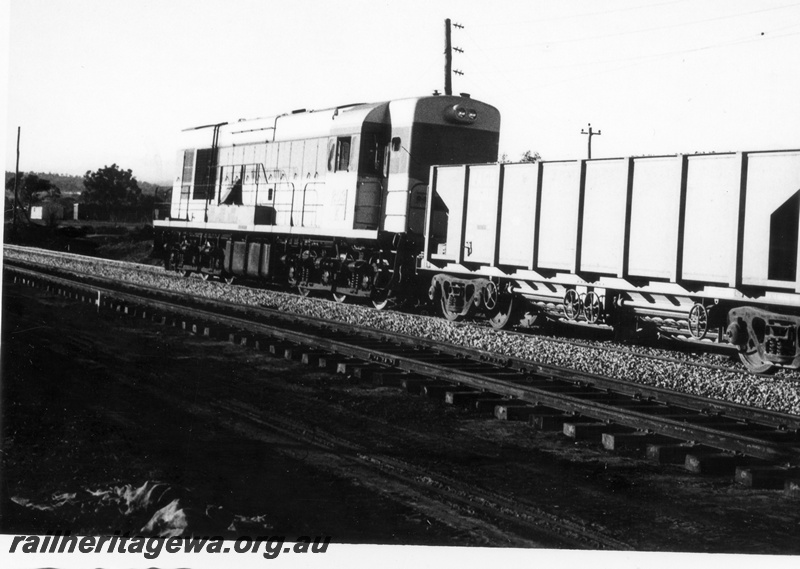 P18427
3 of 5 images of K class 203 on ballast train, moving away from camera, side and end view
