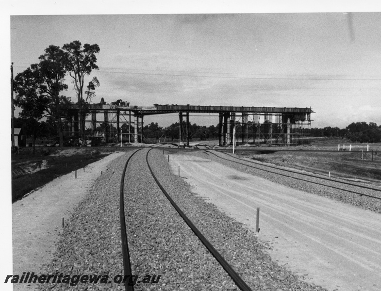 P18429
5 of 5 images of K class 203 on ballast train, flyover under construction, view of new track
