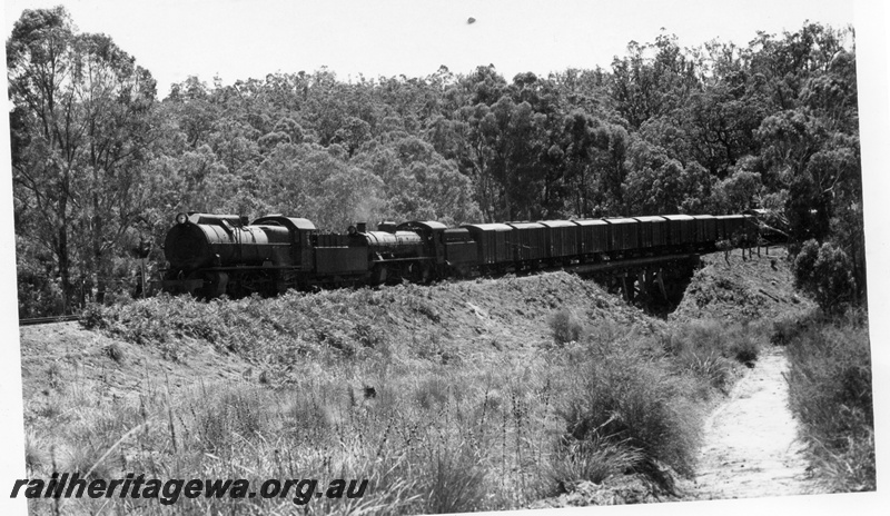 P18455
3 of 5 images of S class 548 and W class 921 double heading Donnybrook to Bridgetown special goods train on PP line, crossing short wooden trestle bridge
