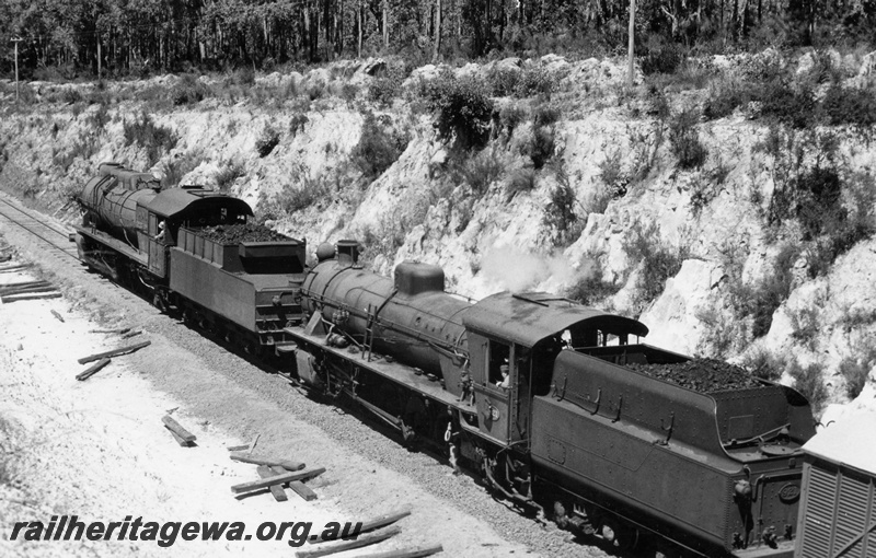 P18457
5 of 5 images of S class 548 and W class 921 double heading Donnybrook to Bridgetown special goods train on PP line, passing through cutting, view down onto the passing locos
