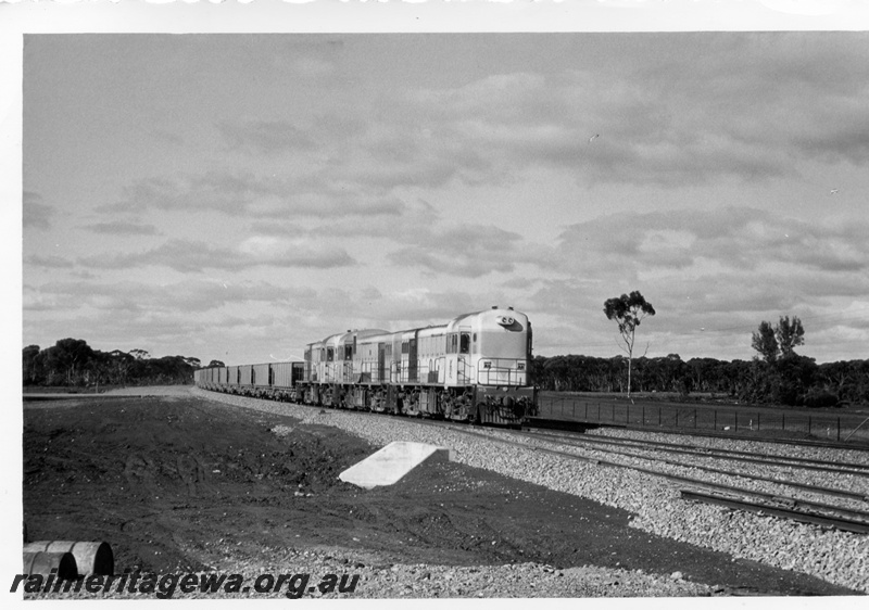 P18468
H class 5, with two other diesel locos, triple heading ballast train, culvert, arriving Bonnie Vale, EGR line
