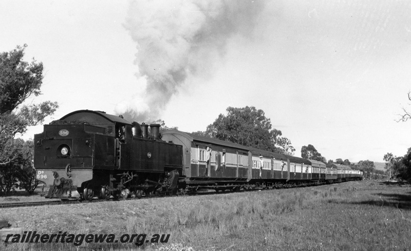 P18483
DD class 596, bunker first, on ARHS tour train, between Isandra and Pinjarra, PN line. Consist includes ZJ class 364, AY class 455, AY class 452, AYC class 511, AYU class 585, AYD class 550, AYC class 510, AY class 26, AY class 454, ZJ class 272
