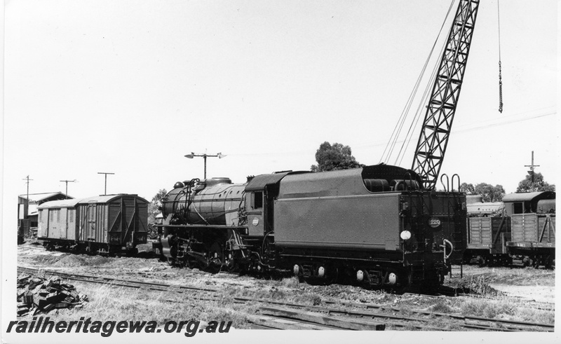 P18496
V class 1220, on trials, goods vans, crane, Midland, ER line, side and rear view
