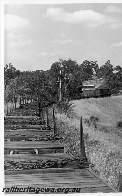 P18499
3 of 5 images of C class 1701 on reclamation train on old ER line, upper quadrant signal, view on curve from rear of the train to the front
