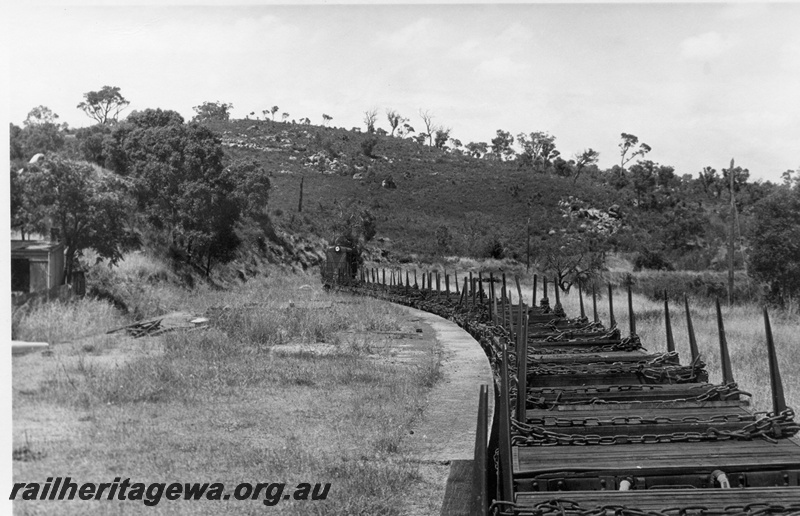 P18500
4 of 5 images of C class 1701 on reclamation train on old ER line, passing Swan View, view on curve from rear of the train to the front
