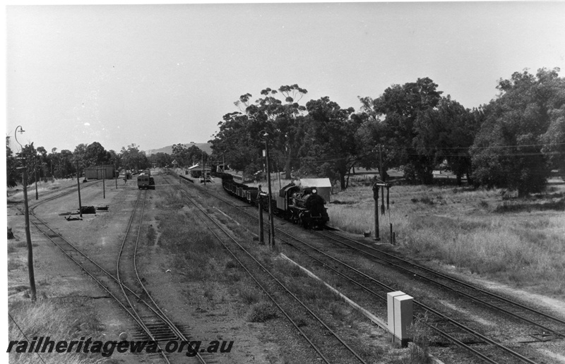 P18504
PMR class 730, on No 35 goods train, goods shed, station building, platform, water columns, Armadale, SWR line
