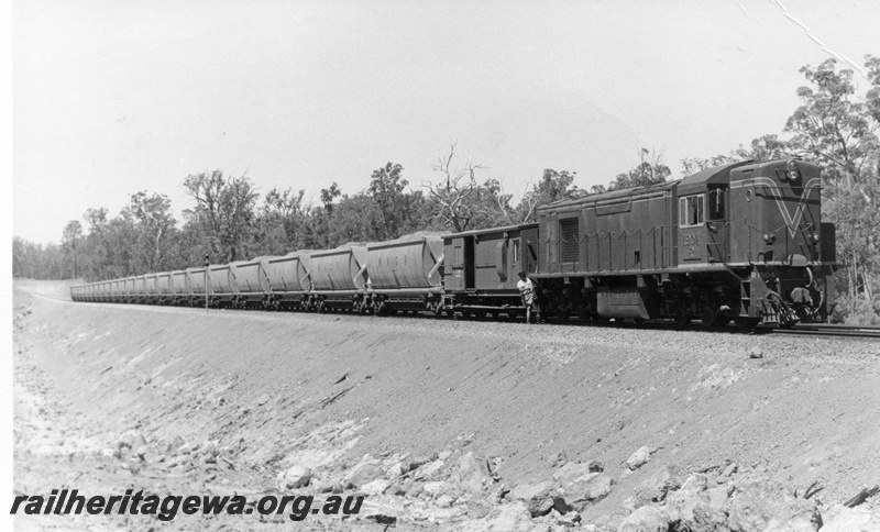 P18517
1 of 5 images of R class 1904 on bauxite service between Jarrahdale and Kwinana, side safety chains on loco, ZS class 570 brakevan with low profile roof, awaiting right away from Jarrahdale No 2 site
