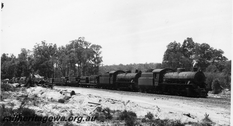 P18595
W class 922, W class 940, on No 344 goods train, level crossing, side and front view
