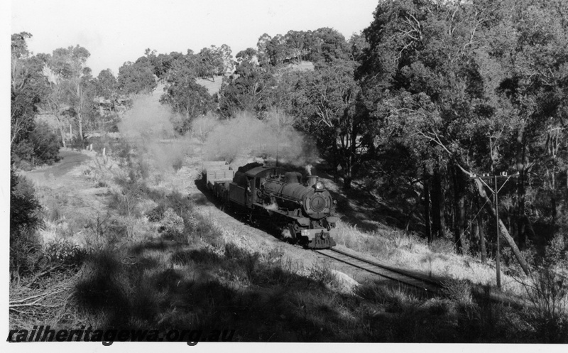 P18601
W class 942, on goods train to Dwellingup, drifting down grade, PN line 
