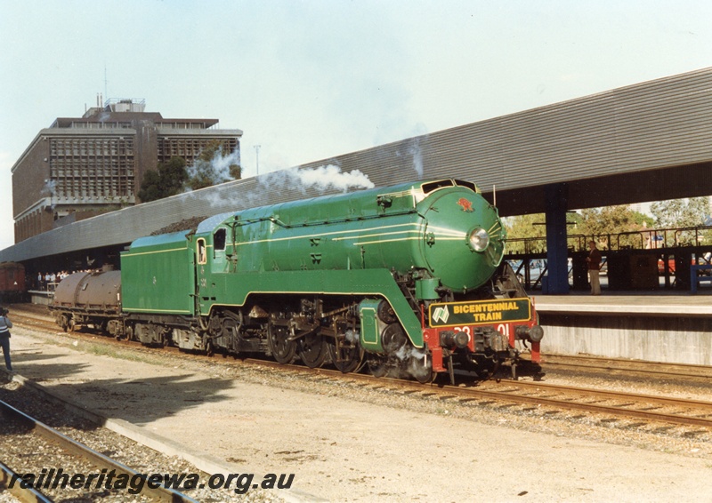 P18630
C class 3801 standard gauge steam locomotive, and water gin, reversing onto coaches at East Perth Terminal prior to returning to Adelaide after its National Bicentennial Train to WA. The locomotive is in the standard NSW green.
