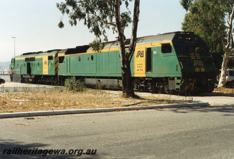 P18636
AN class 9 and GM class 38 standard gauge diesel locomotives at Kewdale after arriving with a freight train.
