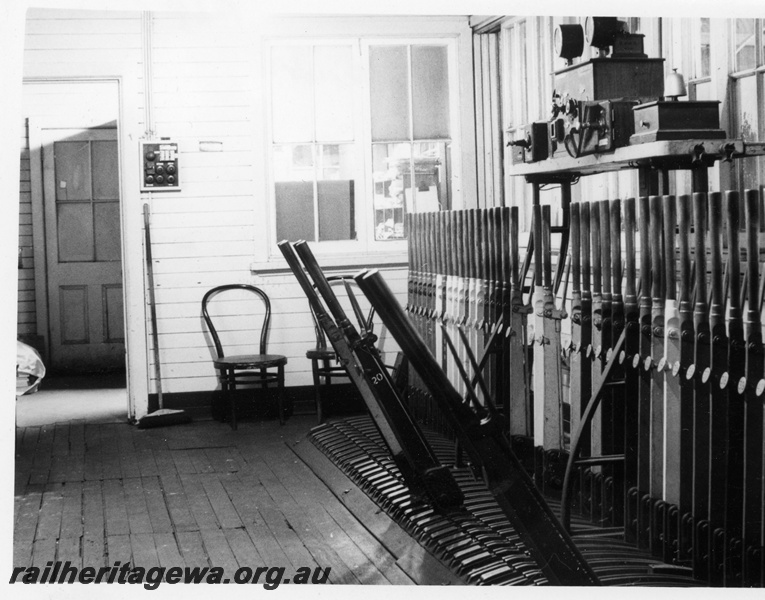 P18694
Signal box interior, levers, frame, standard block instruments,  Bellevue, ER line
