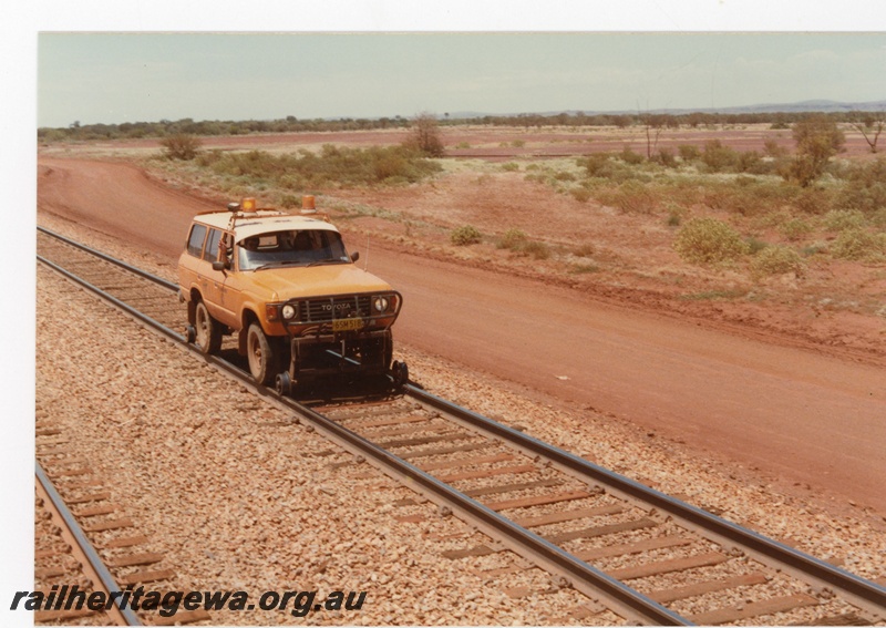 P18730
Mount Newman (MNM) Toyota hi rail on track at Poonda siding
