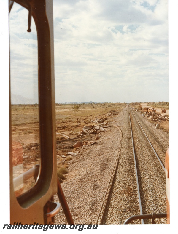 P18741
Mount Newman (MNM) Turner siding - drivers view of derailment.
