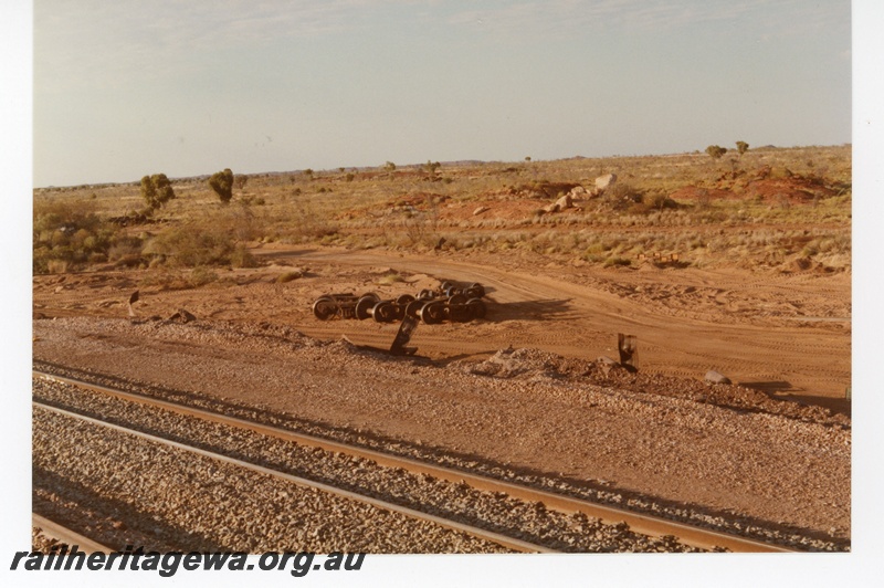 P18743
Mount Newman (MNM) Turner siding derailment - ore car bogies off track. 
