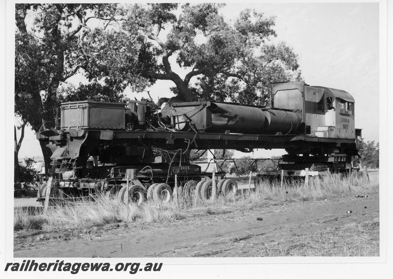 P18828
Cliffs Robe River (CRRIA) C630 class 9417 (former Chesapeake & Ohio Railroad locomotive 2100) on low loader at Gingin en route to Comeng Bassendean. This locomotive was involved in an accident on 19790222. 
