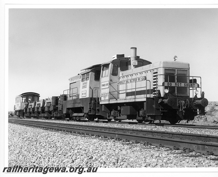 P18834
Hamersley Iron (HI) Speno Rail Grinder TM34 model near Emu.
