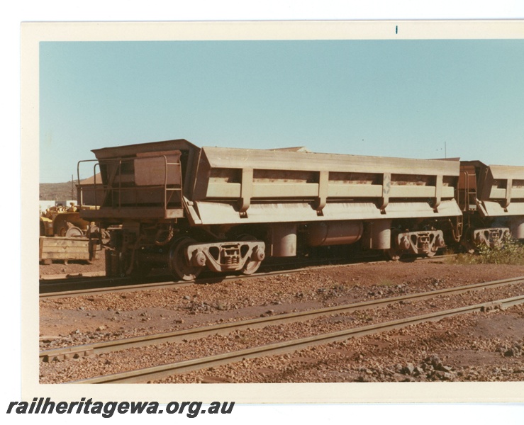 P18874
Goldsworthy Mining (GML) Difco Side Dump Car 3 at workshops Goldsworthy. One of 5 Difco Side Dump Cars owned by Goldsworthy. Used for track maintenance.
