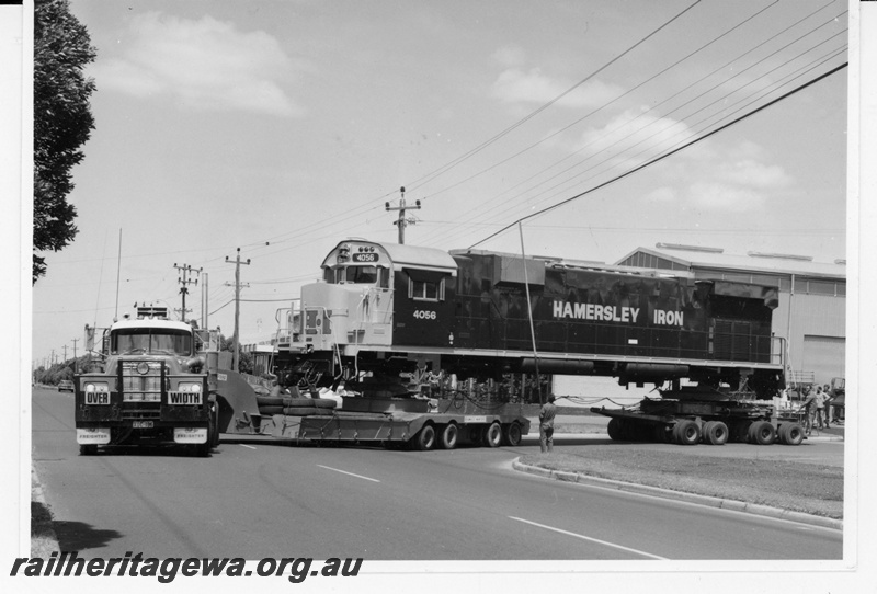 P18957
Hamersley Iron (HI) M636 class 4056 new locomotive on road transporter commences its 5 day 1573 km road journey to Dampier from Comengs works at Bassendean.
