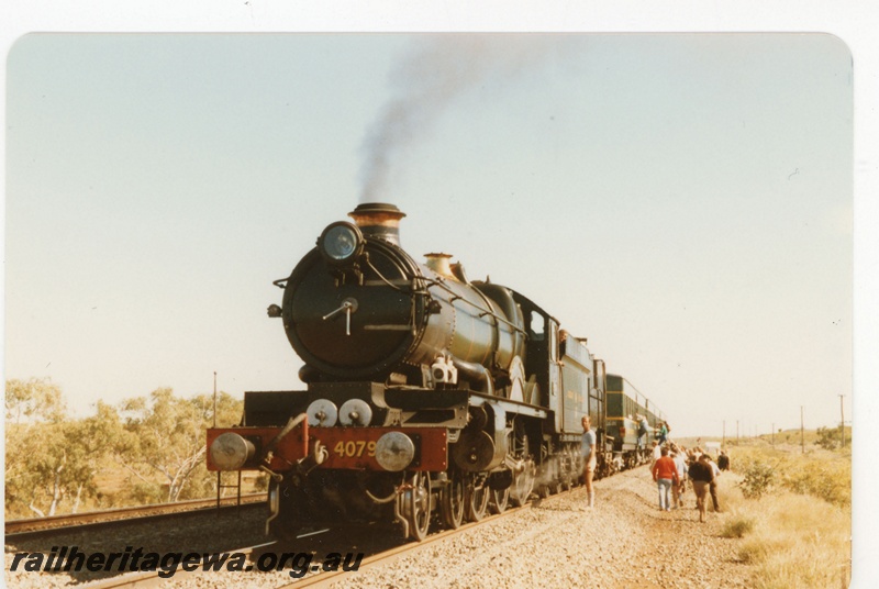 P18961
Hamersley Iron (HI) Pendennis Castle steam locomotive hauling passenger train between Dampier and Tom Price.
