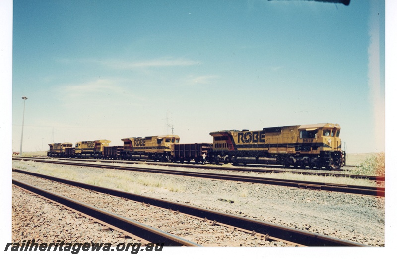 P19053
Robe River Iron Associates (RRIA) CM40-8M class 9419, 9414 and 2 other CM40-8M locomotives Locotrol test Cape Lambert. 
