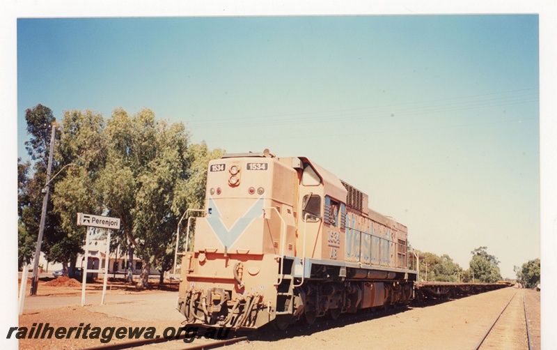 P19078
Westrail AB class 1534 hauling a rails train through Perenjori. Station sign in photo. EM line.
