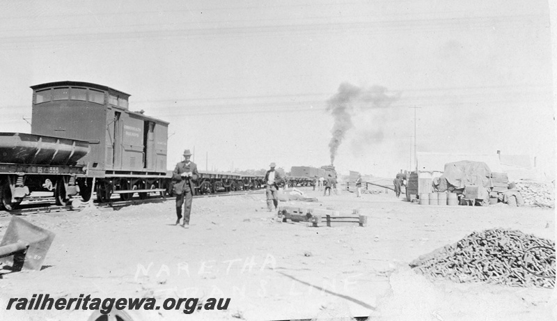 P19177
Commonwealth Railways (CR) steam hauled works train, including BS class 555 wagon, flat wagons, caboose, workers, Naretha, TAR line
