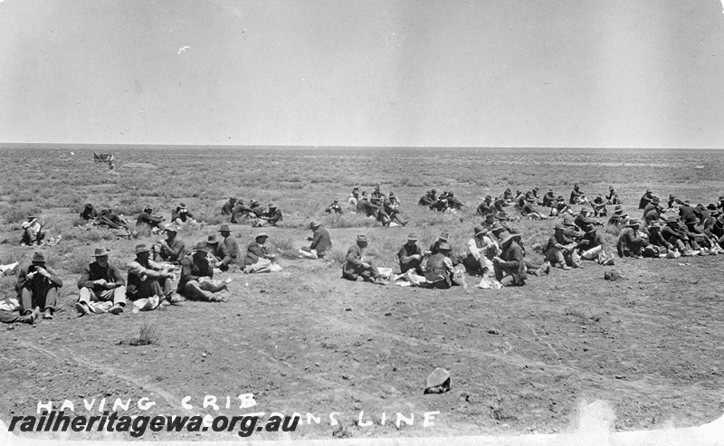 P19185
Commonwealth Railways (CR) workers having crib, 497 mile, TAR line
