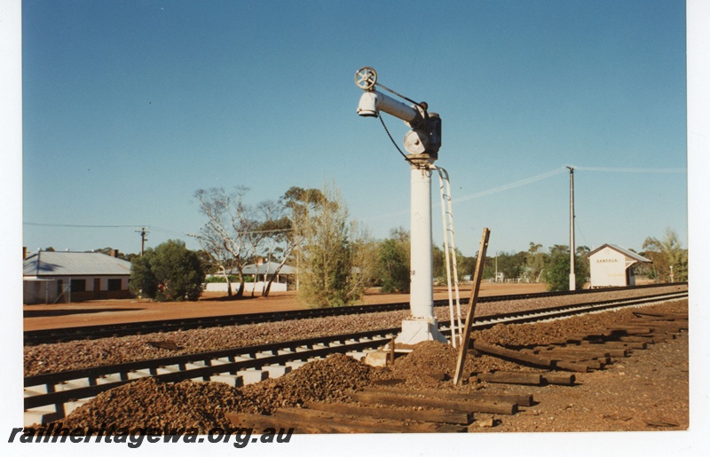 P19204
Commonwealth Railways (CR) station building, houses, barracks, water column, tracks with concrete sleepers replacing wood, Zanthus, TAR line
