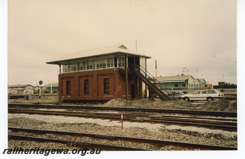 P19273
Signal box B, colour light signal, wharf sheds, Fremantle, ER line, view from trackside 
