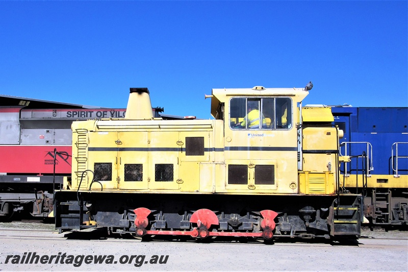 P19317
UGL TA class 0-6-0 diesel shunting loco, yellow livery, on the site of the Railway Transport Museum, side view.
