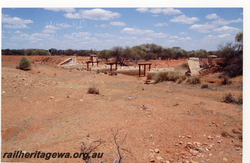 P19329
Remains of old rail bridge, Beatty, NR line, ground level view
