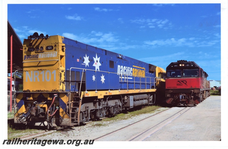 P19344
Pacific National NR class 101on the loop being passed by Mineral Resources MRL class 001 