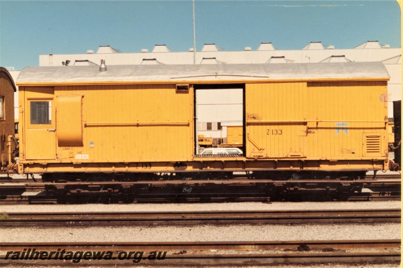 P19376
Z class 133 brakevan, yellow livery Forrestfield yard, side view
