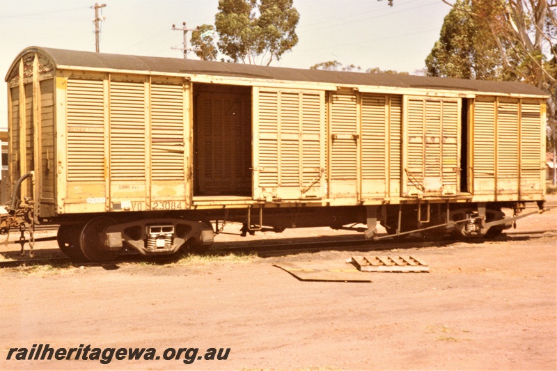 P19412
VD class 23084 louvered van, yellow livery, Corrigin, NWM line, end and side view.
