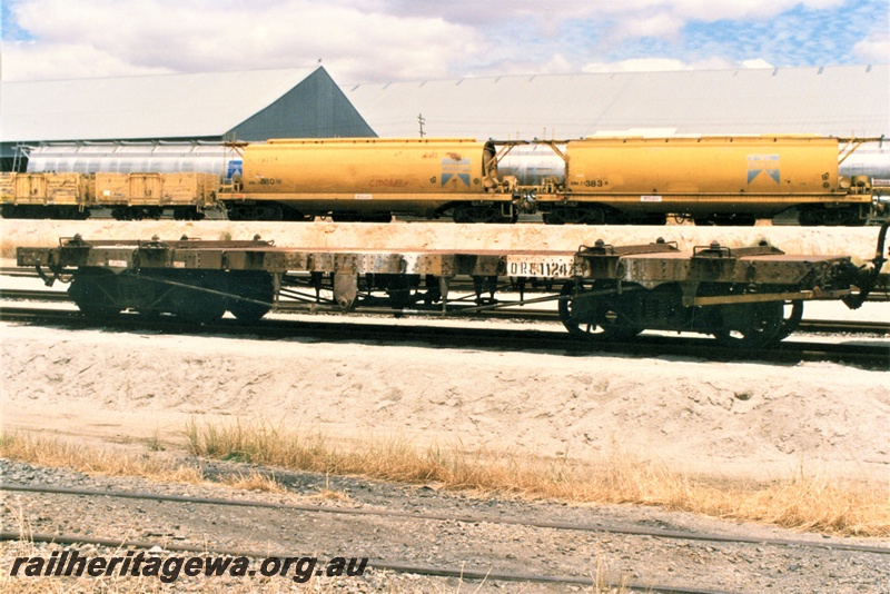 P19445
QRC class 11247 container wagon, yellow livery, Avon yard, side view
